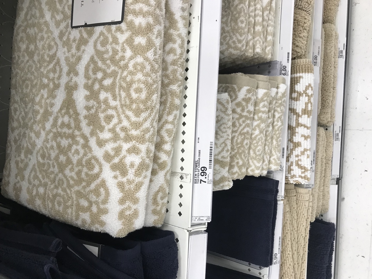 Towel on shelf near price tag